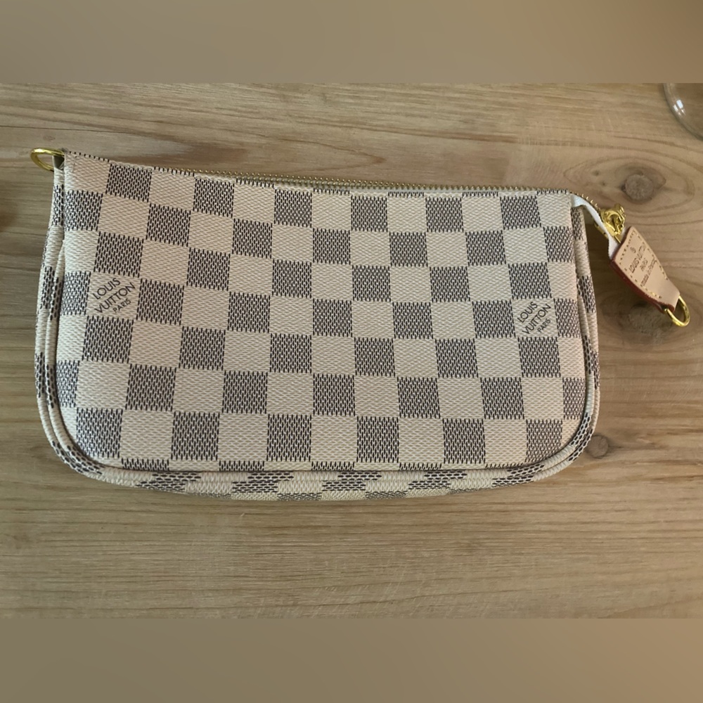 Super cute! Never used Beautiful Azur pochette style pouch with strap